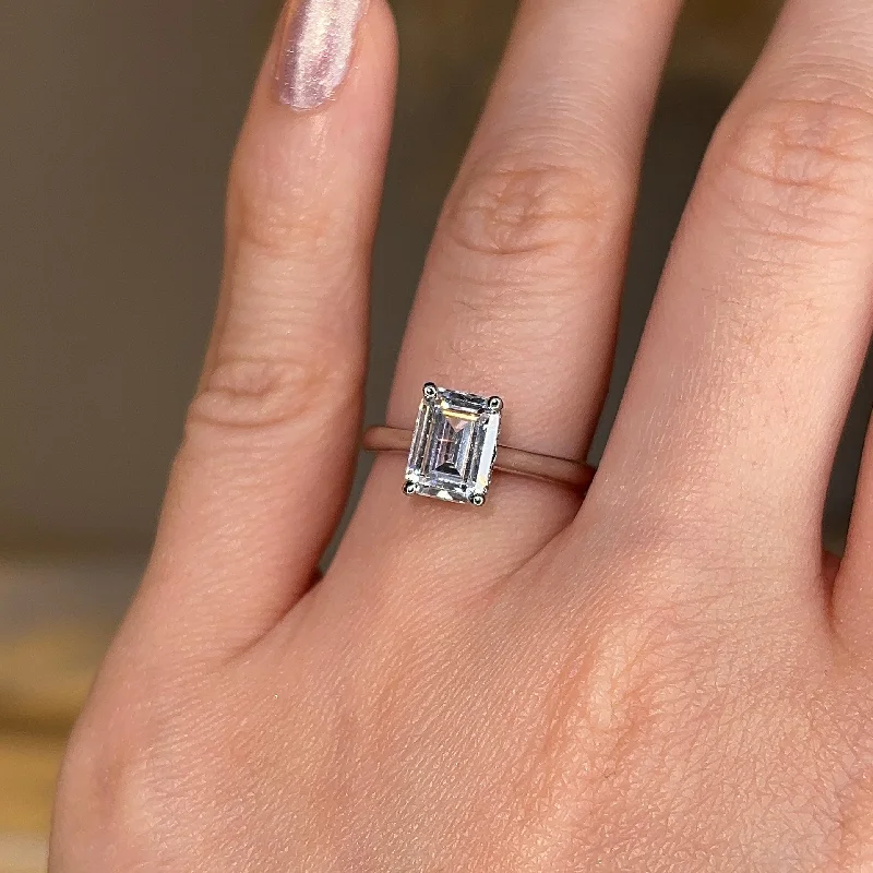 Ladies engagement rings worldwide appeal-"Nina" Emerald Cut Diamond Hidden Under Halo Engagement Ring UHEC01