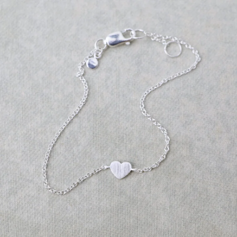 Ladies bracelets minimalist looks-Brushed Sterling Silver Tiny Heart Bracelet