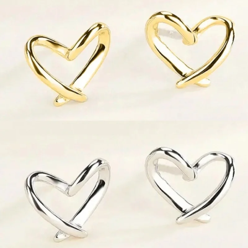 Ladies earrings standout designs-Beautiful Silver or Gold Twisted Heart Stud Earrings