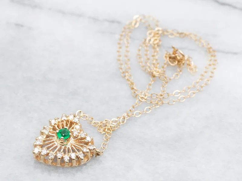 Ladies necklaces collectible items-Gold Emerald and Diamond Halo Heart Shaped Necklace