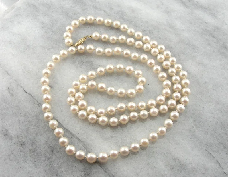 Ladies necklaces social media trends-Long Strands: Pink Pearl Necklace