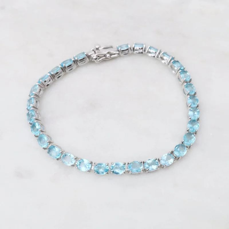 Ladies bracelets group styles-Oval Blue Apatite Tennis Bracelet