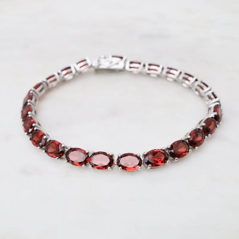 Ladies bracelets Mother’s Day-Oval Garnet Tennis Bracelet