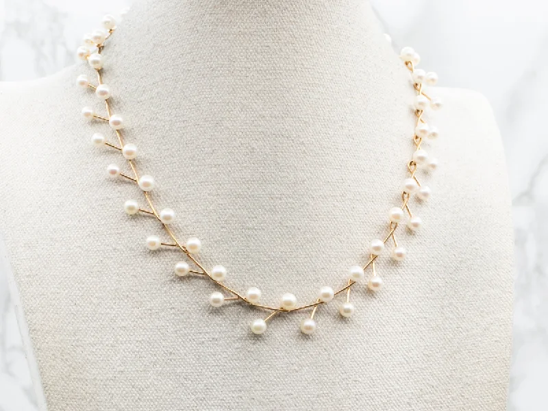 Ladies necklaces star accents-Modernist Gold Saltwater Pearl Necklace