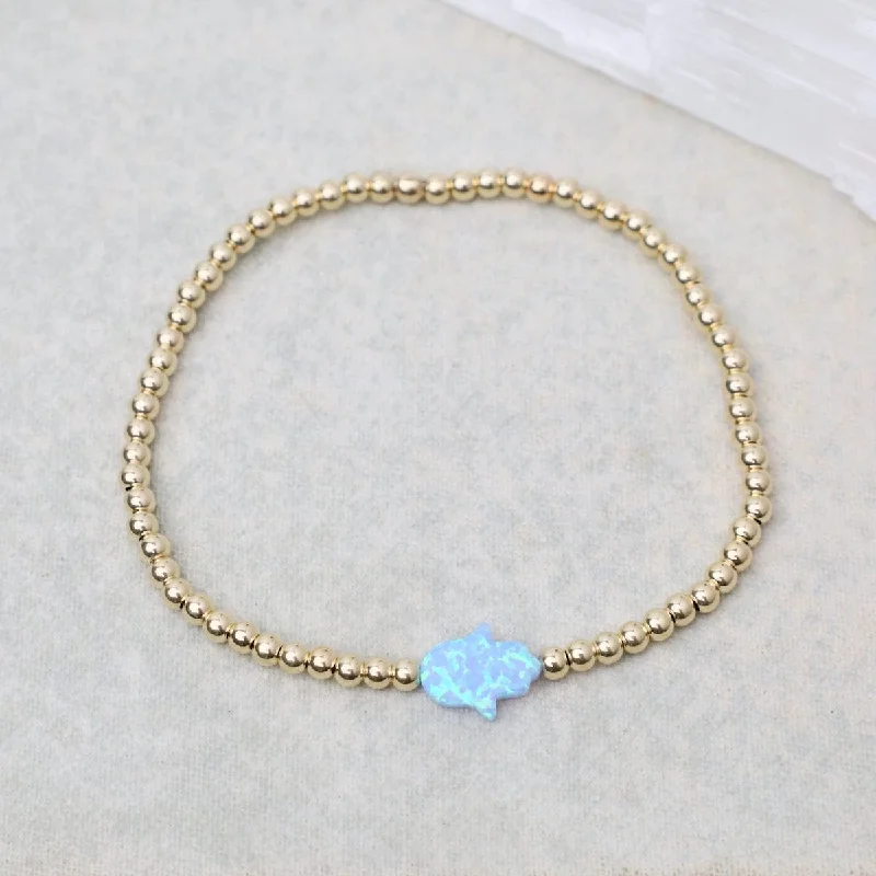 Ladies bracelets size guide-Blue Opal Hamsa Gold Filled Ball Bracelet